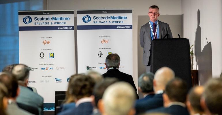Andrew Chamberlain standing in front of the audience at Seatrade Maritime Salvage & Wreck