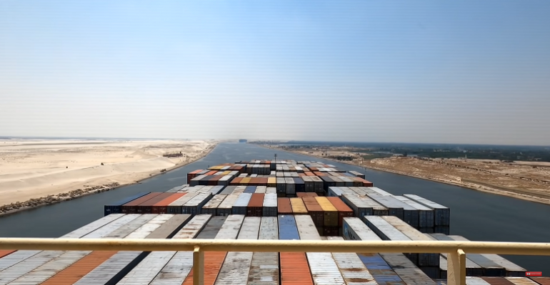 A vessel on northbound transit along the Suez Canal (Credit YouTube).png
