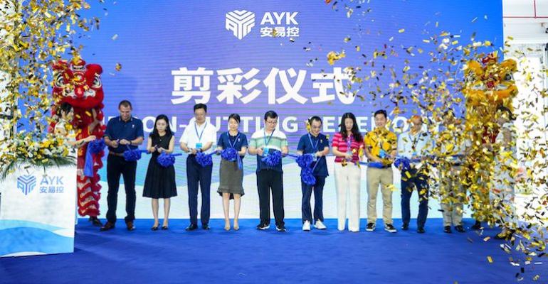AYK Energy China factory opening AYK founder Chris Kruger far left[22].jpg