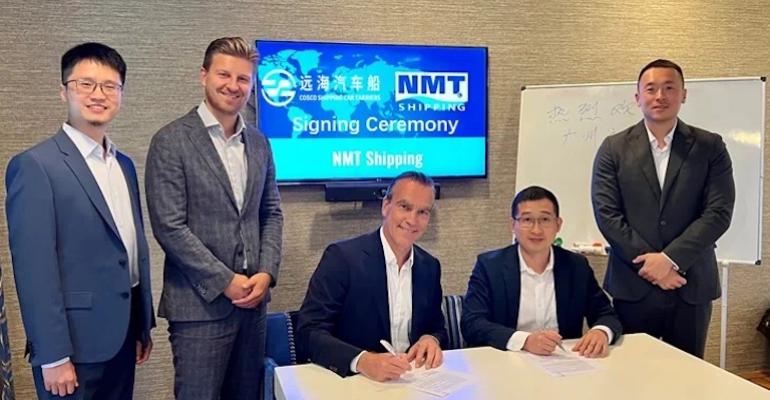 Cosco-shipping-car-carriers-NMT-signing.jpg