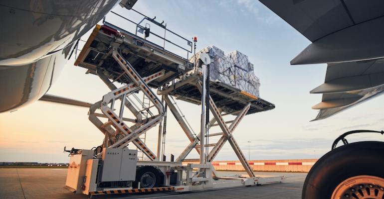 Loading of cargo containers to airplane