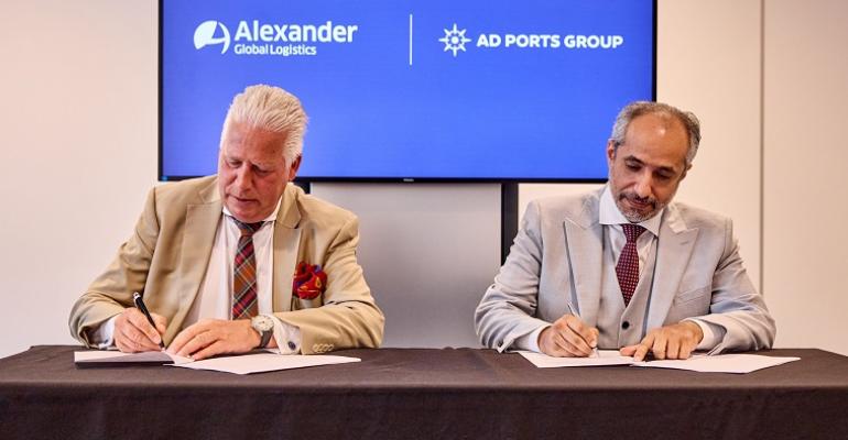 Saif Al Mazrouei ceo Ports Cluster AD Ports Group and Carsten Hellmers ceo AGL sign the agreement (Credit AD Ports Group).jpg