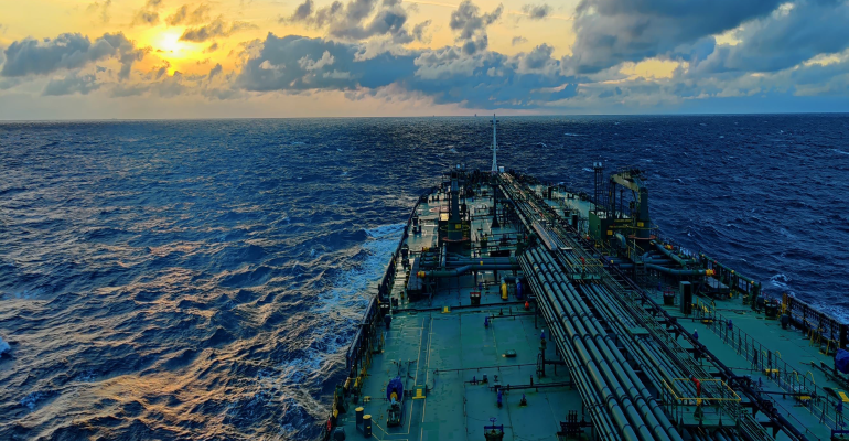 The view over the deck of a tanker at sea