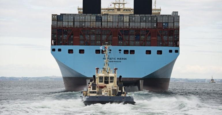 A Svitzer tug escorts container vessel Majestic Maersk