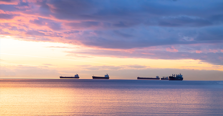 five-ships-in-sea-evening-sky.png