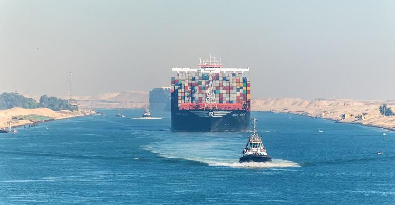 container ship passing through Suez canal