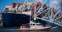 USCG officials survey Baltimore bridge wreckage on container ship Dali
