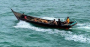 Wooden boat used in a sea robbery in the Singapore Strait